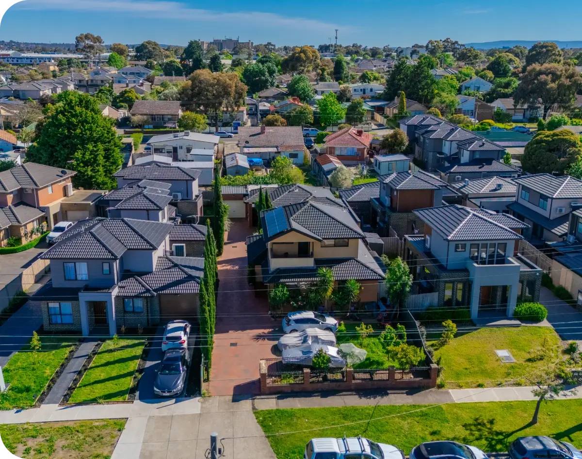 Suburban homes with lush greenery