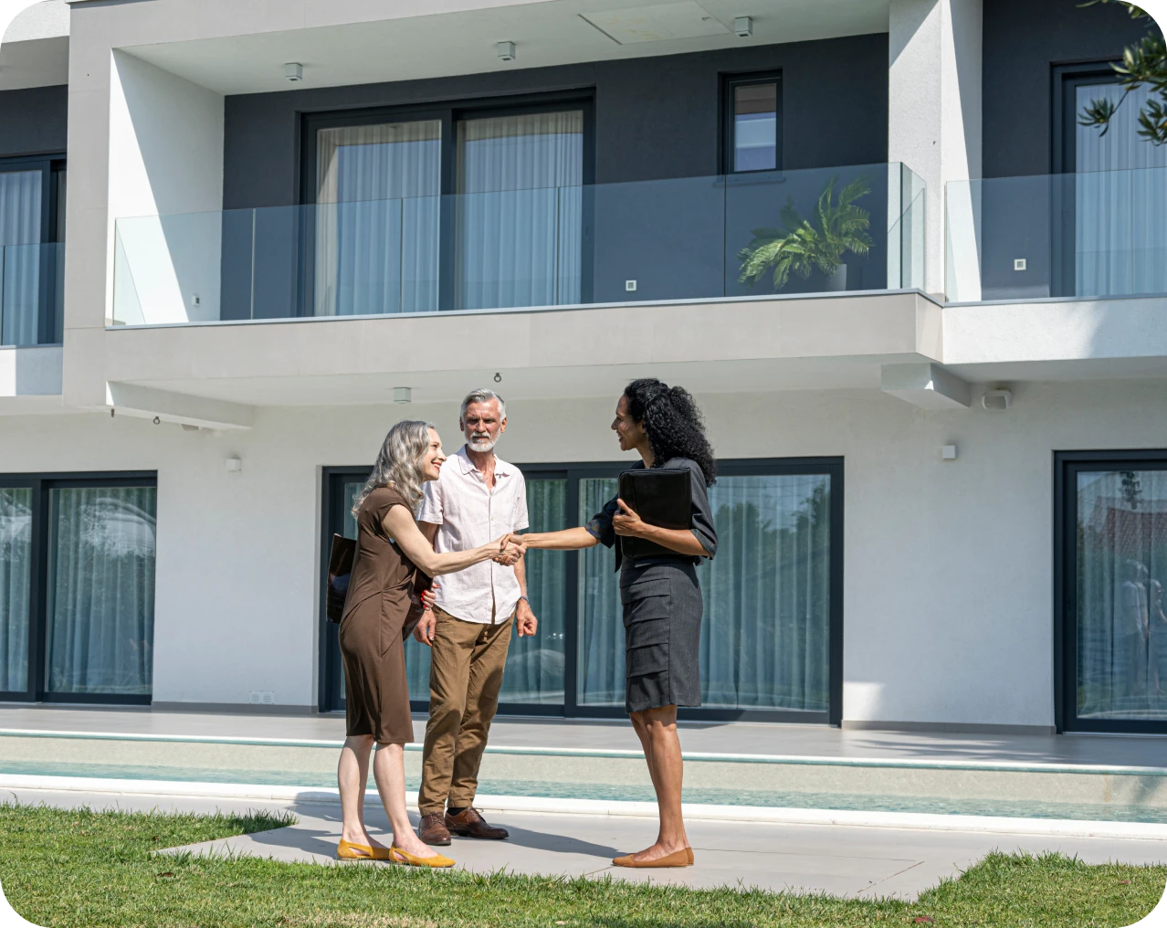 Real estate agent meeting potential buyers