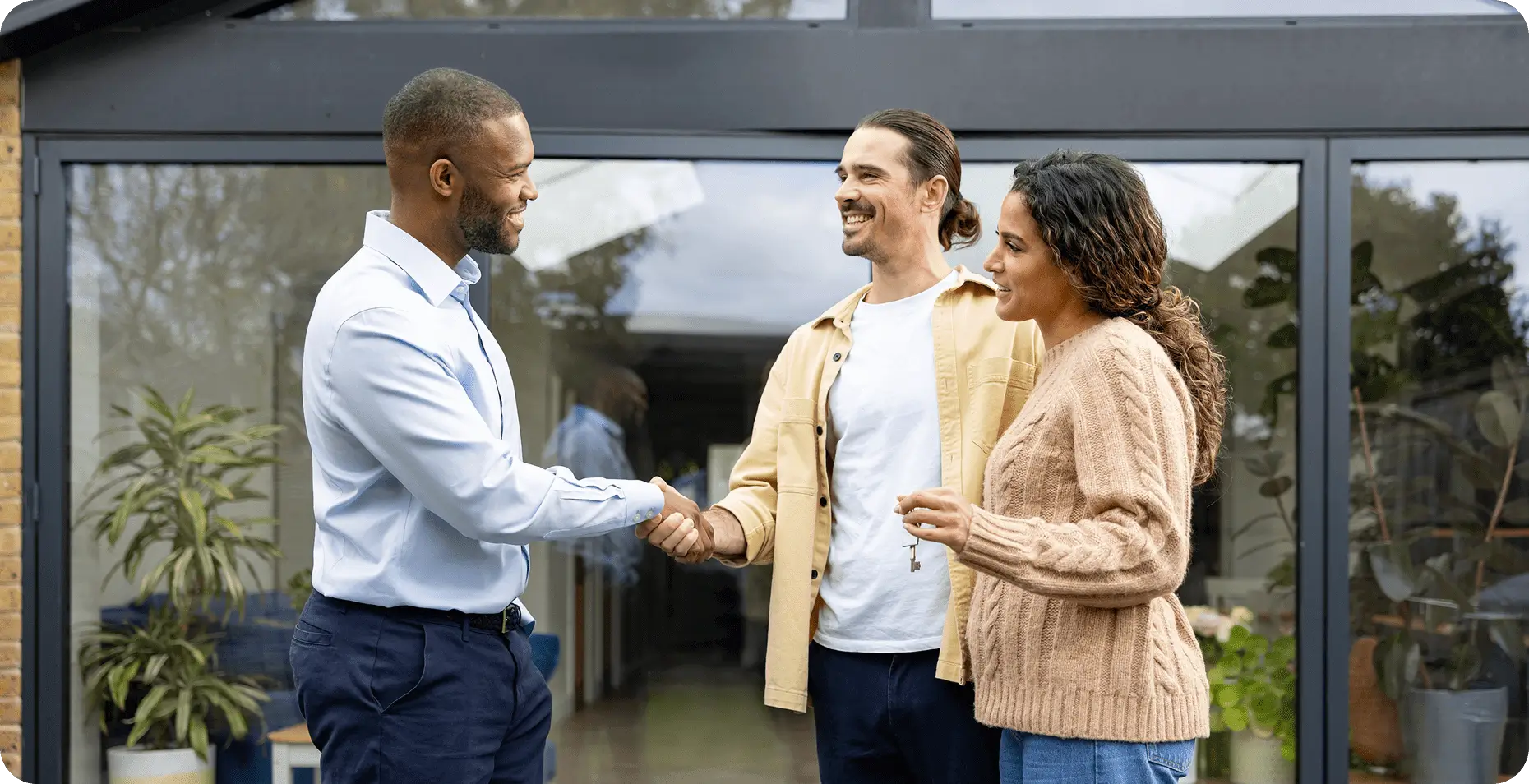Couple meeting with real estate professional